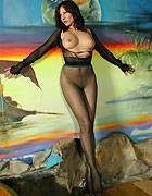 Kerstin relaxes in dark green pantyhose encasement